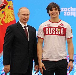 Vic Wild (oik.) ja Venäjän presidentti Vladimir Putin vuonna 2014
