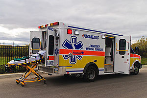 WEMS ambulance with ambulance cot WEMS ambulance siderear.jpg