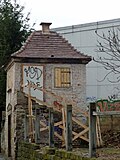 Vineyard cottage and retaining wall