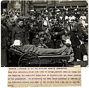 Wounded listening to the bag pipe (sic. for gramophone), and sunning themselves (Brighton, England). Photographer- H. D. Girdwood. (13875039753).jpg