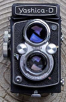 Yashica-D TLR camera front view. This is one of the few cameras that actually says "F-NUMBER" on it. Yashica-D front.jpg