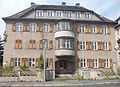 Residential building of the Heimstättengesellschaft Sachsen in Dresden (with wing facing the courtyard) and parts of the enclosure