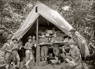 Soldiers take a break at a post exchange in this 1914 photo. 1914 Post Exchange.jpg