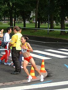 Jiangsu runner Zhou Chunxiu won silver medals in the 10,000 m and marathon. 2005 WC Marathon Women 125 Chunxiu Zhou.jpg