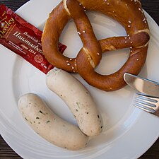 Weißwurst and Brezen - boiled veal sausages with bread pretzels