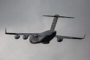 A Boeing C-17 Globemaster III, tail number 95-0103, taking off from RAF Mildenhall in the United Kingdom. It is assigned to the 62nd Airlift Wing and the 446th Airlift Wing at Joint Base Lewis McChord in Washington, USA.