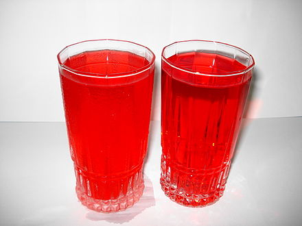 Rooh Afza when mixed with water is bright red in colour. It turns pink when mixed with milk.