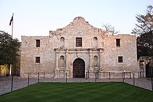 A color photograph of the front entrance of the Alamo Mission
