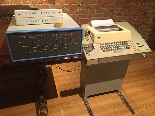 An Altair 8800 computer (left) with the popular Model 33 ASR Teletype as terminal, paper tape reader, and paper tape punch