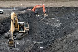 Bearpaw shale being excavated to recover ammonites for ammolite production. Ammolite mining.jpg