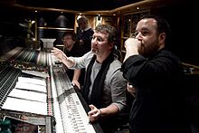 Richards (2nd from front) recording at Air Studios with director Derek Frey, Mike Higham & Ric Levy, 2011. Photograph c/o Leah Gallo Andy Richards, Mike Higham, Derek Frey and Ric Levy at Air Studios, 2011.jpg