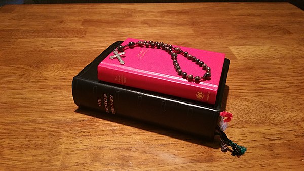 The Anglican Rosary sitting atop The Anglican Breviary and the Book of Common Prayer