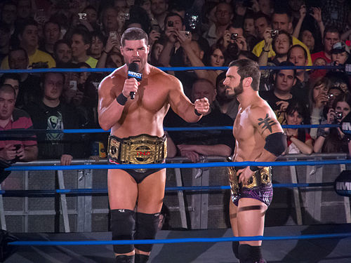 Aries (right) and Bobby Roode as the TNA World Tag Team Champions