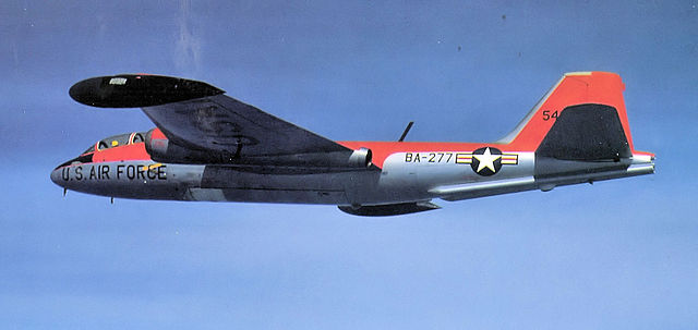 B-57E, AF Ser. No. 55-4277, a target towing aircraft of the 8th Bomb Squadron at Yokota AB, Japan in 1958. Note the bright orange paint on the upper f