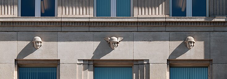 Art Deco mascarons of the Banque Buurmans (Rue Royale no. 71), Brussels, Belgium, by G.J. Maugue, 1927