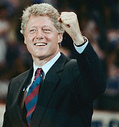 Bill Clinton at North Carolina State University in 1992 pumping his left fist and smiling