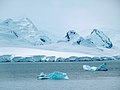 Blue Icebergs and snowy mountains Neumaier Channel Coral Princess Antarctica.jpg