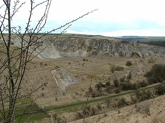 View of Burdale Quarry showing course of disused railway line Burdale Quarry 1.jpg