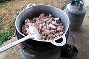 Pork ribs in a cauldron
