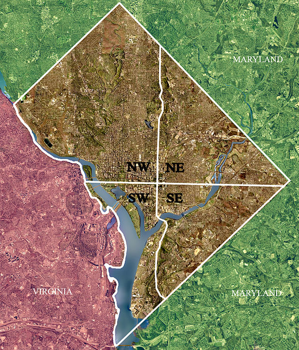 Color-enhanced USGS satellite image of Washington, D.C. with the crosshairs marking the quadrant divisions of Washington, D.C., with the U.S. Capitol 