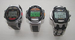 The evolution of the Datalink line shown with metal bands for easy comparison (left to right in order of chronological appearance): Datalink model 50 (1994), Ironman Triathlon, with the Ironman Triathlon logo on the upper part of the face (1997) and Datalink USB sports edition (2003). The small lens is seen on both model 50 and the Ironman. Note also the inverted circular arch digital display frame design on the model 50, compared to the frame design of the other two models. The Microsoft logo appears at the top, while the Datalink logo appears at the bottom for model 50. The lower button arrangement and platform is the same for both model 50 and Ironman triathlon, but Ironman sports an additional start/split button on its face, indicating its additional chronograph functions. All three models are water resistant to 100 m. The model 50 (Timex models 70502/70518) was worn by astronaut James H. Newman on STS-88. Datalink models 50, Ironman Triathlon and Ironman USB.JPG