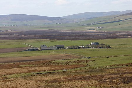 Ellibister and surrounding farm land viewed from foot of Hammars Hill looking towards Redland and Firth. Ellibister.jpg