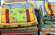 Fabrics and rugs made in Erode are famous