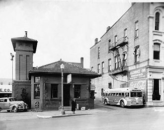 The former interurban station at 116 W. Huron, served by Greyhound buses, circa 1939 Former interurban station serving as the Greyhound bus depot -- West Huron Street, Ann Arbor, Michigan -- 1939%3F (14837079891).jpg