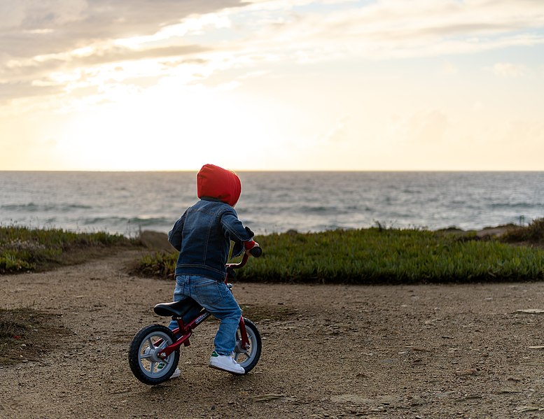 File:Gabriel riding a balance bike, Porto Covo, Portugal (PPL1-Corrected) julesvernex2.jpg