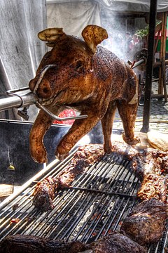 Spanferkel, a spit-roasted suckling pig in German cuisine[13]