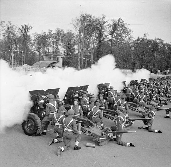 British Victory Parade in Berlin: Salute fired by guns of the 3rd Royal Horse Artillery on the arrival of Prime Minister Winston Churchill.