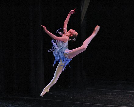 A ballet jump performed with modern, non-classical form in a contemporary ballet