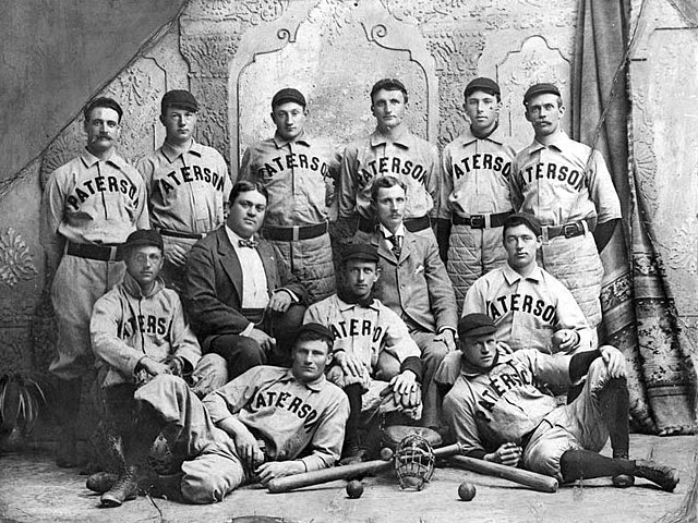 Wagner as a player on the Paterson Silk Sox team, 1897. He is third from left in the back row.