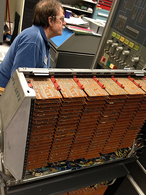 Rack of IBM Standard Modular System expansion cards in an IBM 1401 computer using a 16-pin gold plated edge connector first introduced in 1959
