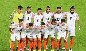 Kuruniyan (back row third from left) with India in the 2019 AFC Asian Cup.