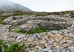 Inside the Celtic Iron Age hillfort of Tre'r Ceiri, Gwynedd Wales, with its 150 houses; finest in Europe 47.jpg