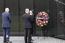 Cindy McCain, Secretary James Mattis and Chief of Staff John F. Kelly lay a wreath at the Vietnam Veterans Memorial. John McCain wreath laying at the Vietnam Veterans Memorial (43686596314).jpg