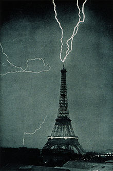 Lightning striking the Eiffel Tower in 1902. The metal tower acts as a colossal lightning conductor. The presence of multiple bolts shows this is a time-exposure photograph Lightning striking the Eiffel Tower - NOAA.jpg