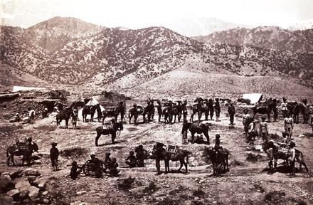 A mule battery in the Second Anglo-Afghan War (1879–1880): Sepoys are sitting by the larger field guns.