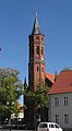 de: Neugotische Kirche St. Johannis, 1853 nach Plänen von Friedrich August Stüler gebaut; rechts Robert Koch Haus.