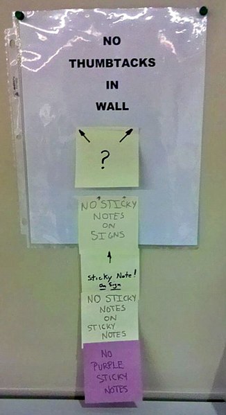An example of self-referential humor on a shared noticeboard