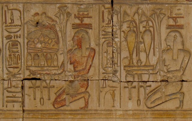 Sunk relief of personified provinces of Egypt bearing offerings for the temple god, from the mortuary temple of Ramesses II at Abydos. Thirteenth cent