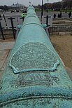 Long cannon barrel with inscription in Arabic script