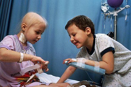 Two girls with ALL demonstrating intravenous access for chemotherapy