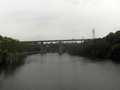 The Twin Bridges, built 1960, partially rebuilt, 1985, and partially rebuilt, 2010, are a pair of steel-plate girder bridges that span the Schuylkill River in Fairmount Park in Philadelphia, Pennsylvania. They carry northbound and southbound traffic on the Roosevelt Expressway (U.S. Route 1) just north of its intersection with Interstate 76. Looking downstream from the Kelly Drive, with the Falls Rail Bridge and the Bridge at West Falls further downstream.