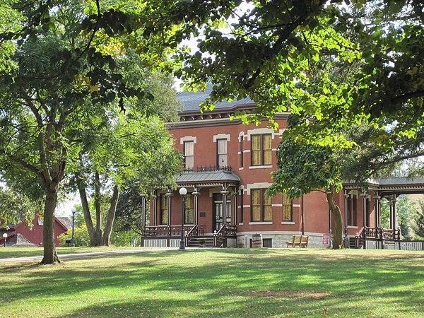 The Martin-Mitchell Mansion, within the Naper Settlement outdoor museum, is listed on the National Register of Historic Places