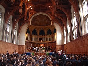The 2004 Prize Giving ceremony at the Wills Memorial Building. The boarders and prefects can be seen in their bluecoat uniforms at the centre of the picture. QEH Prize Day 2004.JPG