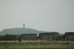 Gun bunker at the Bandeath weapons depot, with the Wallace Monument in the background