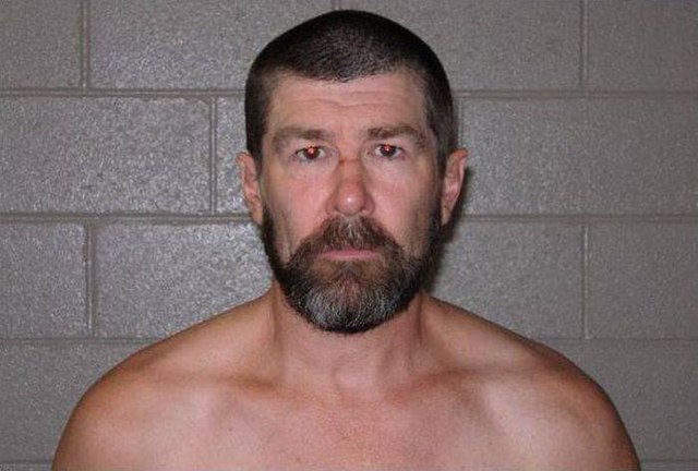 Wounded killer escapee moved from hospital to prison in central