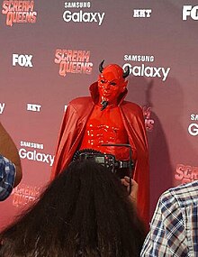 Riley Schmidt as the Red Devil at the LA Premiere of Scream Queens. Riley Schmidt as Red Devil on the Red Carpet.JPG